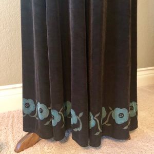 Long skirt with floral detail on hem